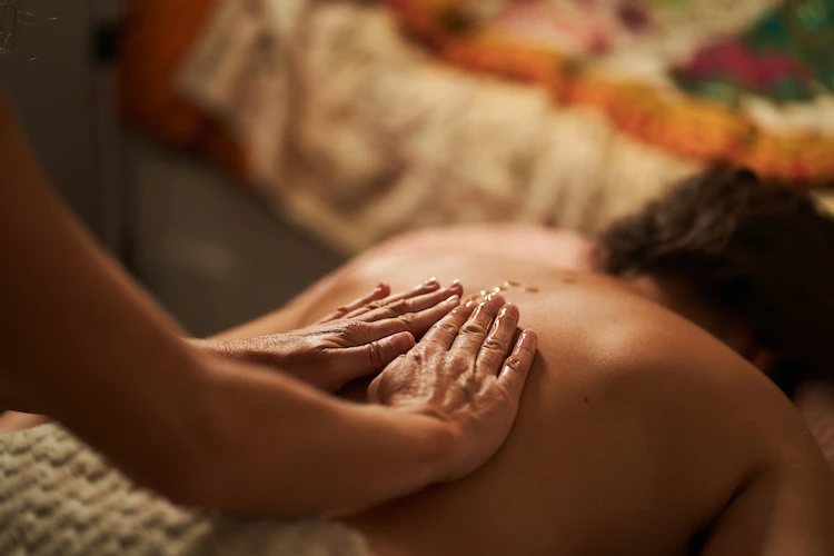 hands-giving-a-relaxing-massage-with-aromatherapy-2026-03-20-03-48-37-utc